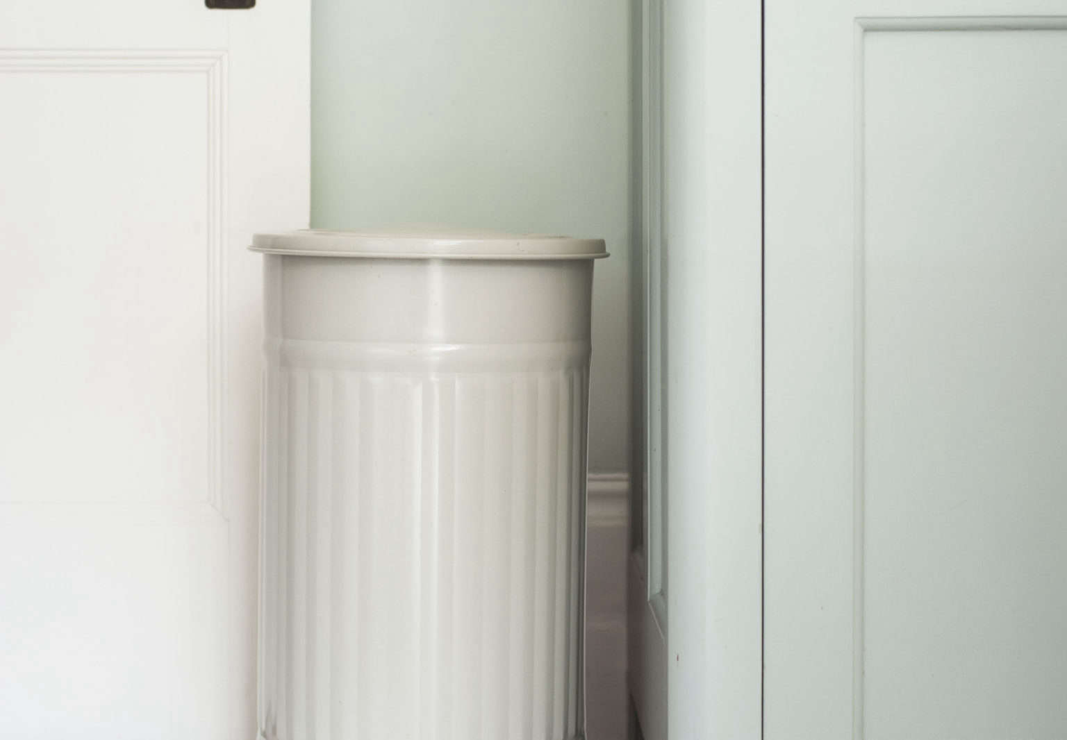 Enameled steel pedal kitchen bin from Garden Trading. Matthew Williams photo