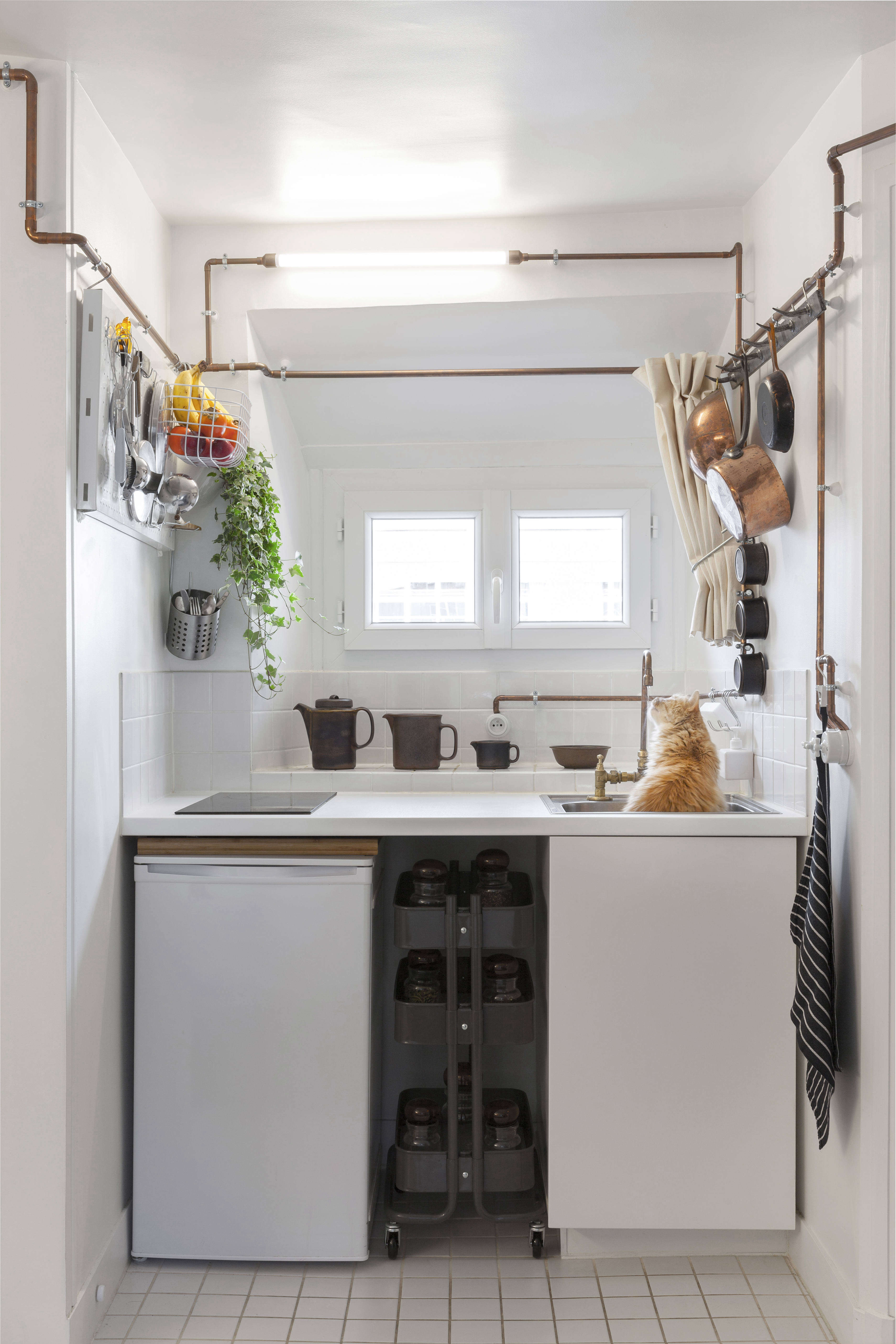 Kitchen with Copper Pipes in Shaker Studio Airbnb in Paris by Ariel Claudet, Photo by Cyrille Lallement